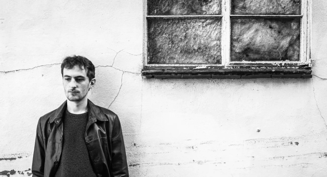 Portrait against a cracked wall
